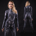 Woman wearing the Nocturnal Butterfly costume, a full-body suit with dark butterfly motifs and wing details, ideal for Halloween events or mystical festival outfits.
