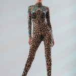 Powerful front pose in LEOPARD SPOTS Tattoo Catsuit for Women – confident stance without sunglasses.