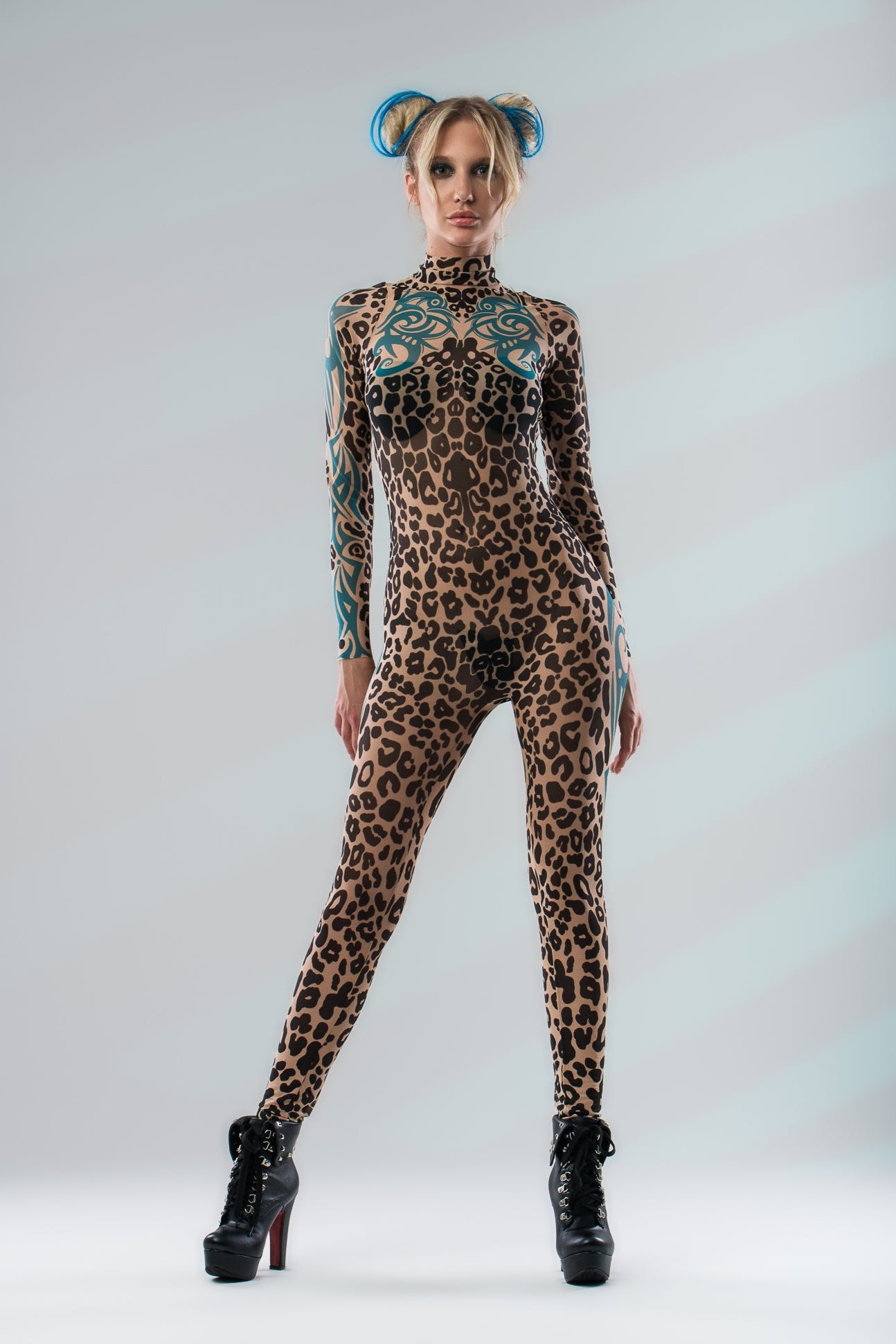Powerful front pose in LEOPARD SPOTS Tattoo Catsuit for Women – confident stance without sunglasses.