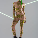 Front view of GREEN TRIBAL Tattoo Catsuit – UV Reactive – worn alone, showcasing the tribal tattoo design.