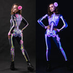 Close-up of the UV-reactive pink skeleton doodle design on the Halloween costume, glowing under UV light for a unique and bold look.