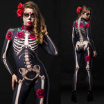Women wearing a skeleton bodysuit with red rose accents and matching floral cloak, styled for Halloween. The outfit is inspired by Day of the Dead with intricate sugar skull face makeup and a crown of red roses.