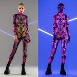 Collage showing the Neon Flowers Catsuit in UV and natural light – one design, two dazzling effects with radiant festival energy.