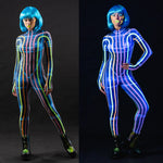 Woman posing in the Space Lines UV Reactive costume, highlighting the neon space line design that lights up under UV light, ideal for raves, Halloween, or as a unique festival outfit.