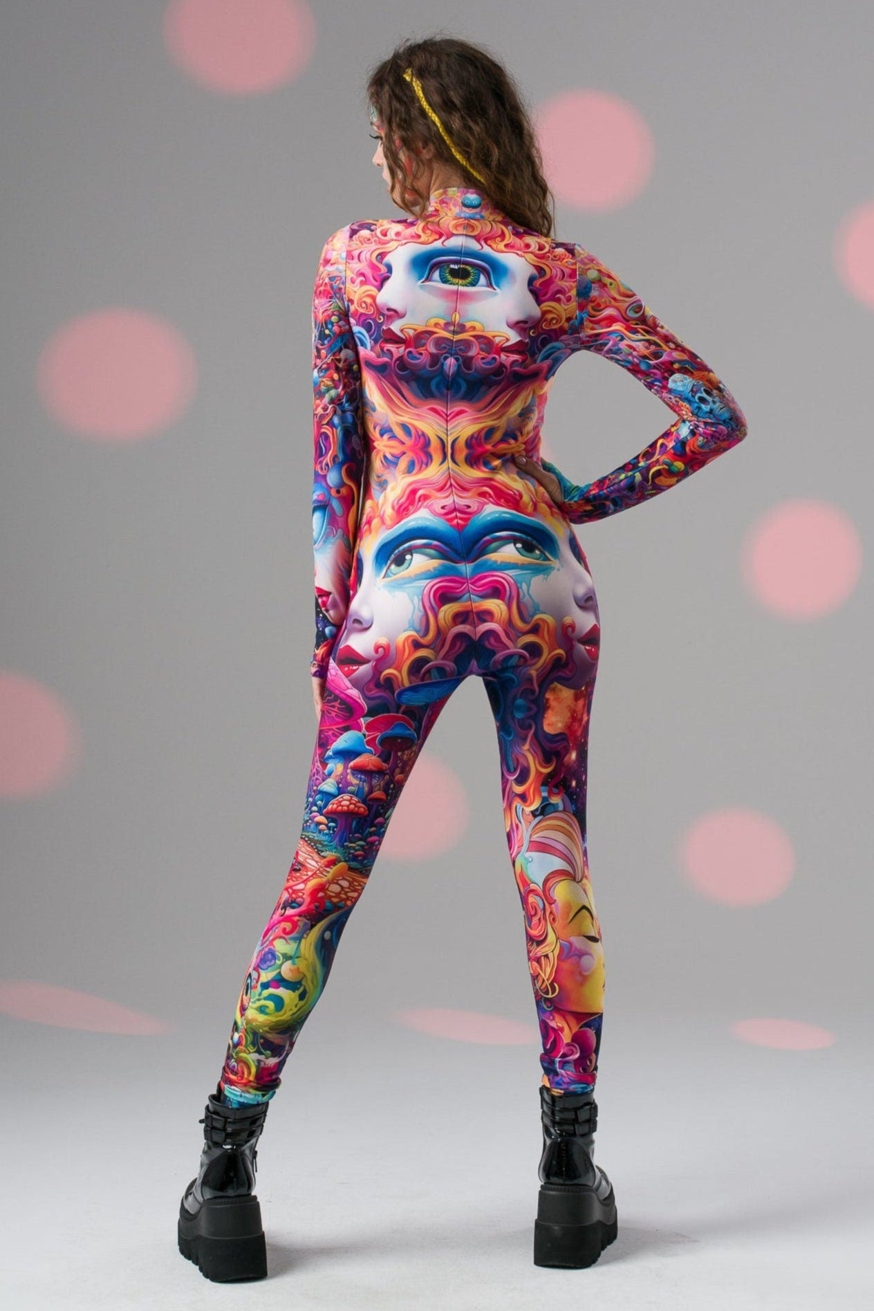 Back view of TRIPPY DREAM Catsuit, highlighting surreal psychedelic patterns and detailed design for standout festival wear.