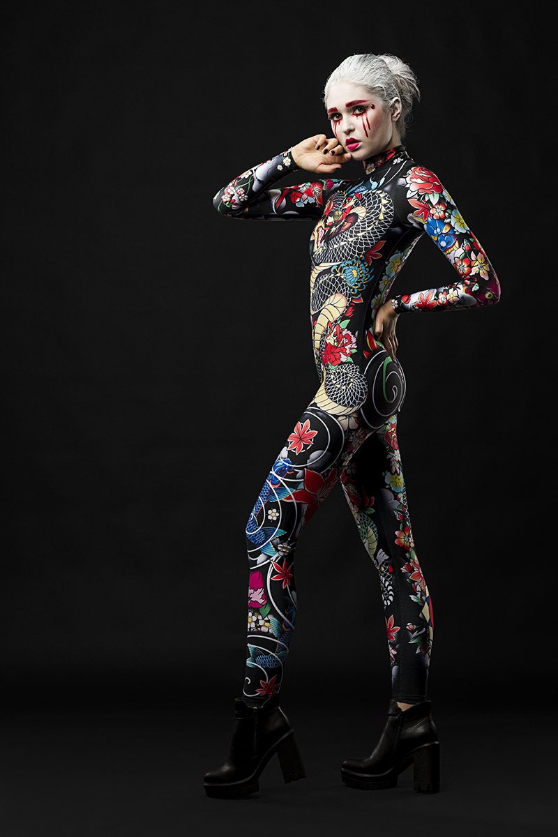 Woman wearing the Yakuza Style Geisha costume, a full-body tattoo-inspired catsuit with Japanese-themed designs, perfect for Halloween parties or themed festivals.