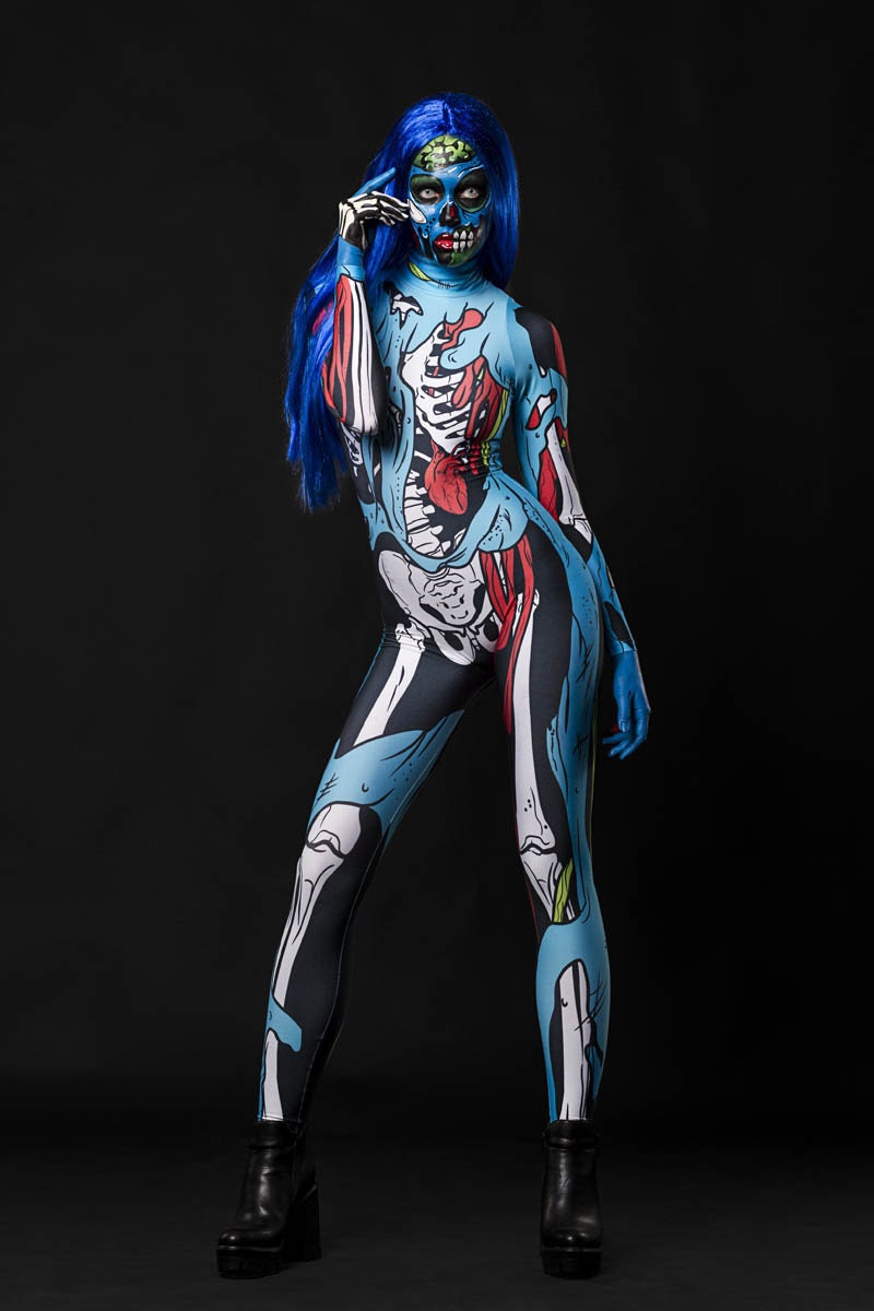 Model posing in the Zombie Skeleton Halloween costume, highlighting the blue comic-style skeleton and zombie design, great for Halloween parties or as a standout cosplay outfit.
