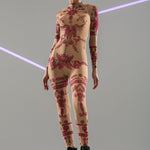 Front view of PINK TRIBAL Tattoo Catsuit – natural light – highlighting vivid pink tribal motifs.