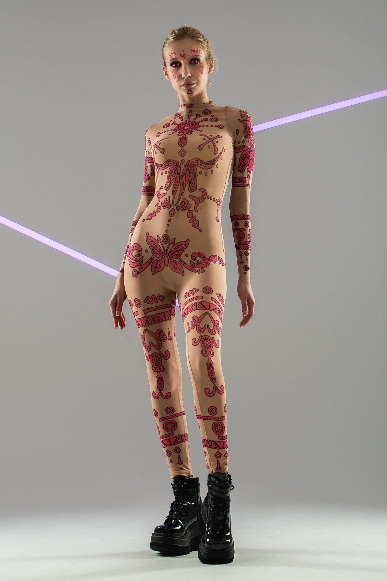 Front view of PINK TRIBAL Tattoo Catsuit – natural light – highlighting vivid pink tribal motifs.