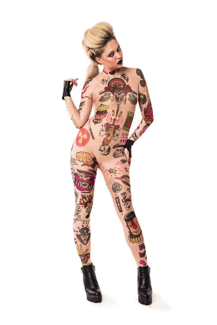 Front view of REBEL TATTOOS (color) Tattoo Catsuit for Women – styled with fingerless gloves for an edgy look.