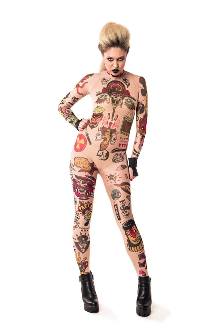 Powerful front pose in REBEL TATTOOS (color) Tattoo Catsuit for Women – showcasing bold tattoo patterns and confident stance.