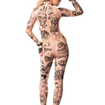 Full back view of REBEL TATTOOS (black) Tattoo Catsuit for Women – highlighting intricate black tattoo patterns across the back.