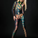 Woman posing in the Snakes & Spiders Skeleton Halloween costume, highlighting the intricate snake, spider, and skeleton details, great for Halloween parties or as a standout festival outfit.