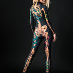 Woman posing in the Snakes & Spiders Skeleton Halloween costume, highlighting the intricate snake, spider, and skeleton details, great for Halloween parties or as a standout festival outfit.