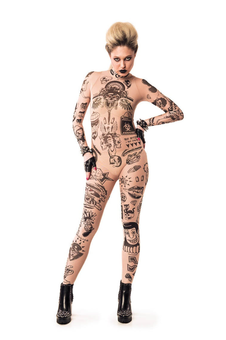 Front view of REBEL TATTOOS (black) Tattoo Catsuit for Women – model posing confidently with hands on hips, emphasizing the powerful design.