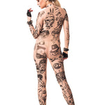 Dynamic back view of REBEL TATTOOS (black) Tattoo Catsuit for Women – model showcasing fingerless gloves for a rebellious, edgy look.