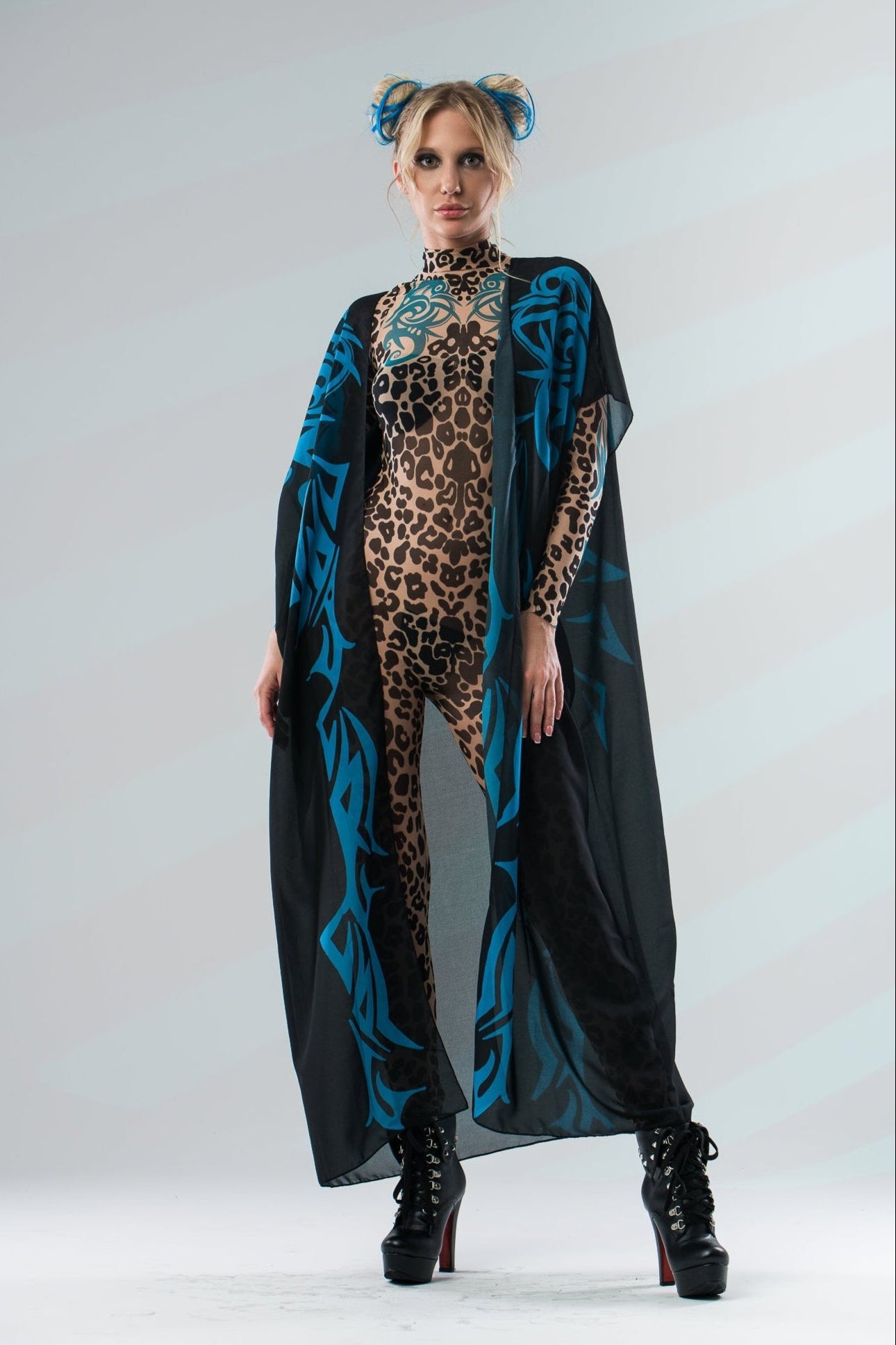 Front view of LEOPARD SPOTS Tattoo Catsuit for Women styled with sleeveless kimono – blending tattoo print with flowing kimono layer.