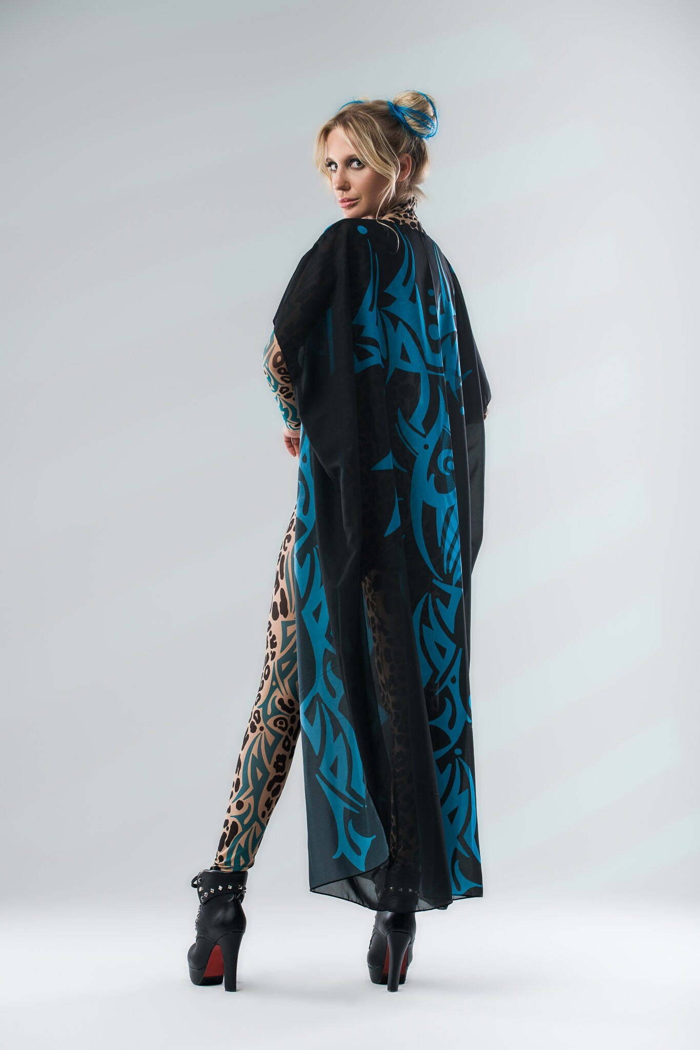 Back view of LEOPARD SPOTS Tattoo Catsuit for Women with sleeveless kimono slightly shifted to reveal tattoo design underneath.