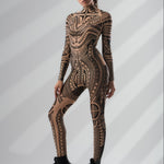 Three-quarter side view of MAJESTIC TRIBAL Tattoo Catsuit for Women – emphasizing the detailed tribal tattoo effect and flattering fit.