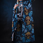 Close-up of the intricate blue butterfly prints on the Blue Monarchy kimono cape, showcasing the delicate design and ethereal style. Festival, dance music.