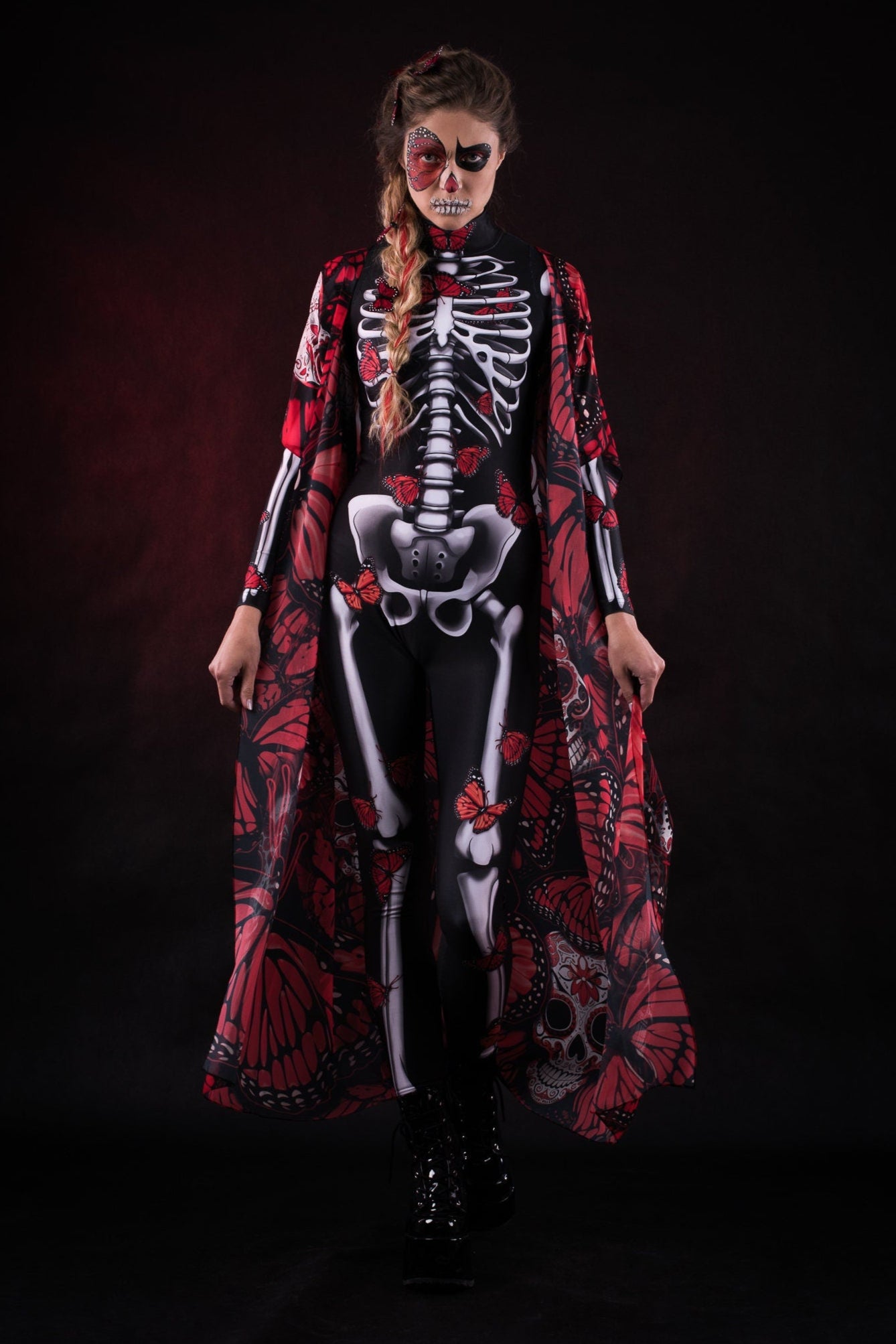 Close-up of the intricate red butterfly designs on the flowing kimono cape, ideal for adding a dramatic touch to Halloween or festival outfits.