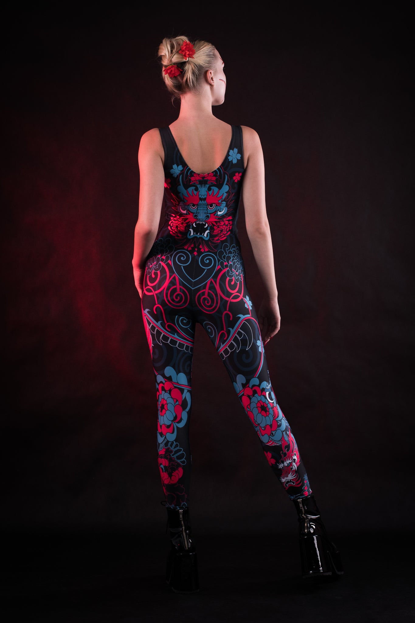 Woman posing in the Oriental Blossom costume, highlighting the detailed floral design and elegant fit, great for Halloween, cosplay, or as a unique festival outfit.