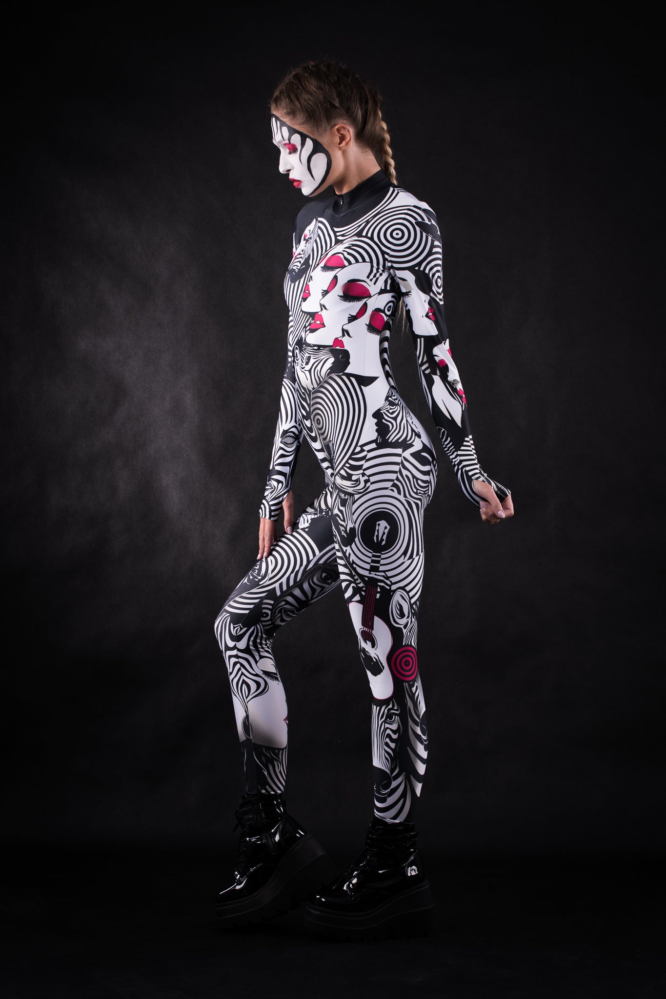 Woman posing in the White Zebra Femme Halloween costume, showcasing the bold black and white zebra design, great for Halloween, festivals, or as a stylish statement outfit.