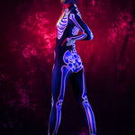 Woman wearing the UV reactive neon pink skeleton costume, a full-body fluorescent jumpsuit perfect for Halloween or rave festivals.