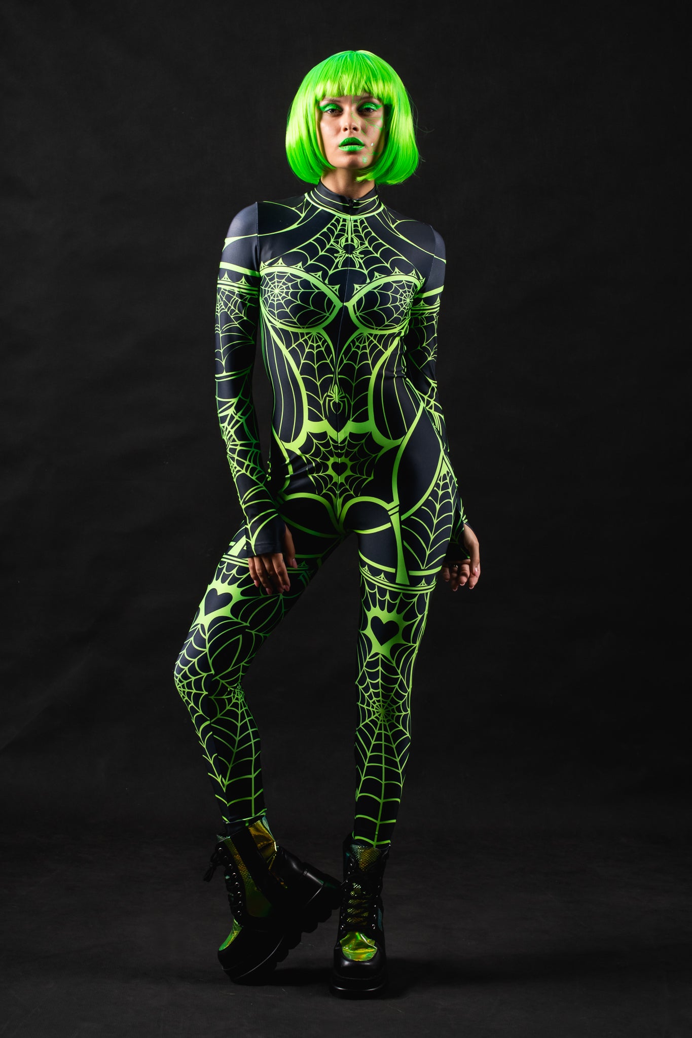 Green Neon Spiderweb UV Reactive costume for women, featuring a vibrant green spiderweb design that glows under UV light, perfect for Halloween, raves, or festivals.