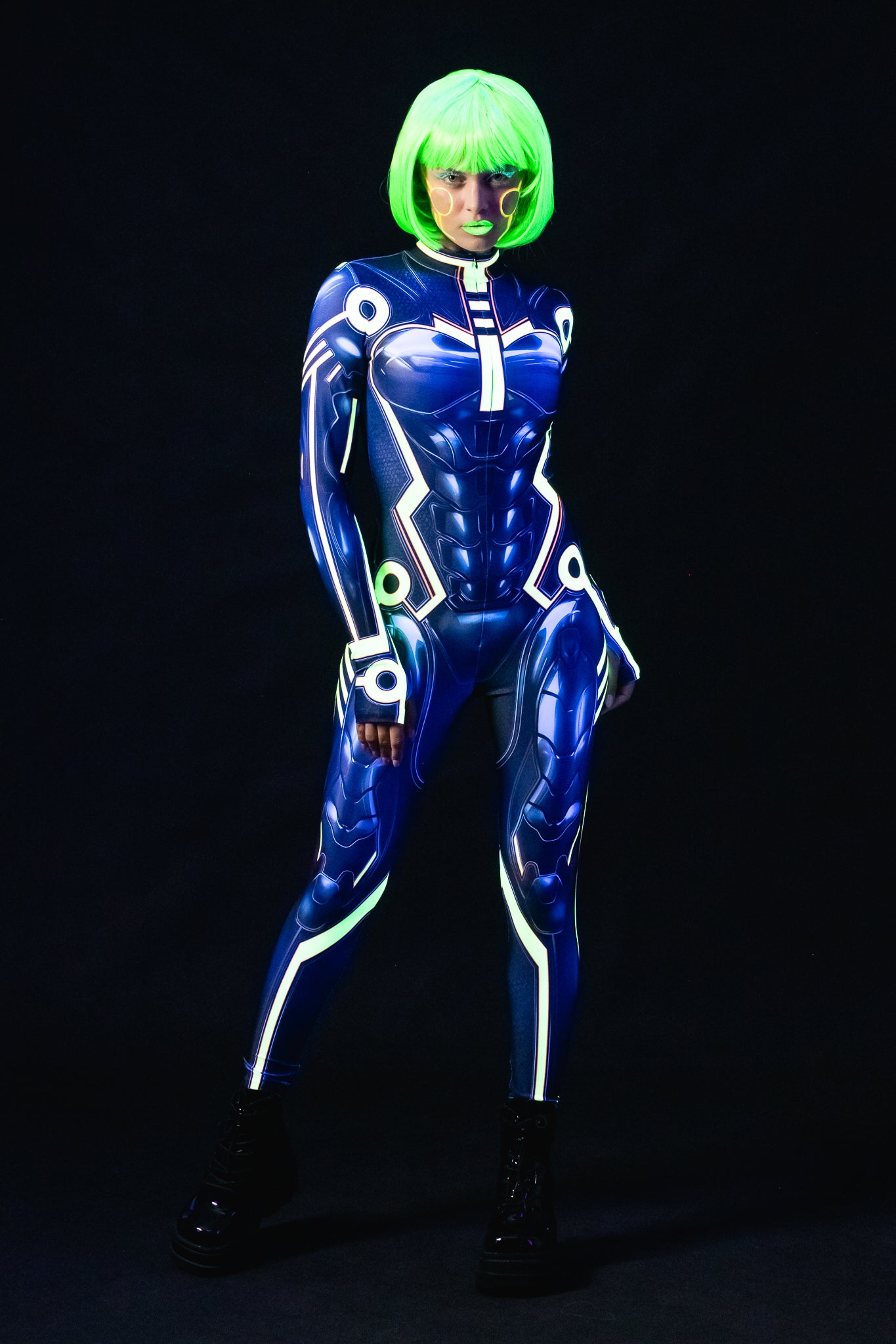 Cyber Tron UV Reactive costume for women, featuring a futuristic full-body design with neon accents that glow under UV light, ideal for raves, festivals, or Halloween.