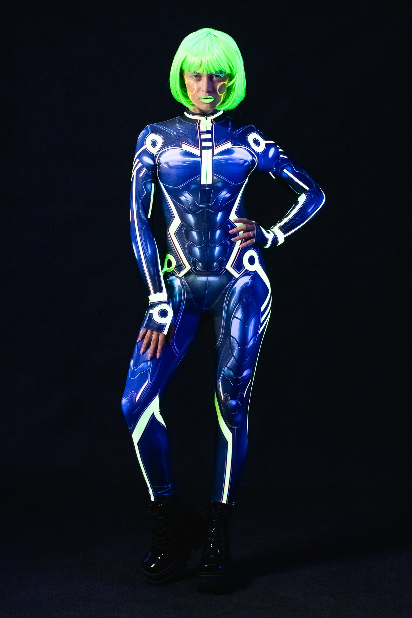 Cyber Tron UV Reactive costume for women, featuring a futuristic full-body design with neon accents that glow under UV light, ideal for raves, festivals, or Halloween.