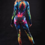 Dynamic back pose of a woman in Galaxy Explorer full body costume, highlighting cosmic print and detailed tailoring for cosplay and themed parties.