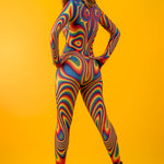 Full back view of Rainbow Liquid Catsuit, showcasing all-over rainbow print and sleek design perfect for raves and Pride events.