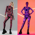Comparison collage of the SUNSET VOLTAGE UV Reactive Catsuit – front view under UV light vs. daylight, showing its glowing transformation.
