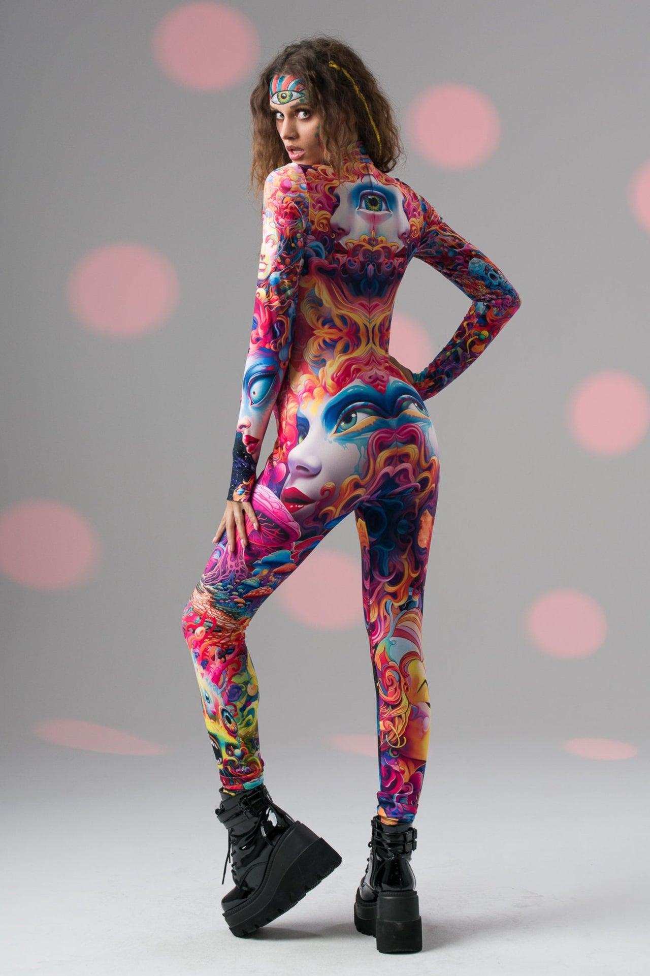 Back-side angle of TRIPPY DREAM Catsuit, showcasing swirling surreal colors and tailored fit ideal for festivals and events.