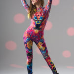 Front view of TRIPPY DREAM Catsuit with arms raised, emphasizing bold psychedelic colors and energetic full body fit for festivals.