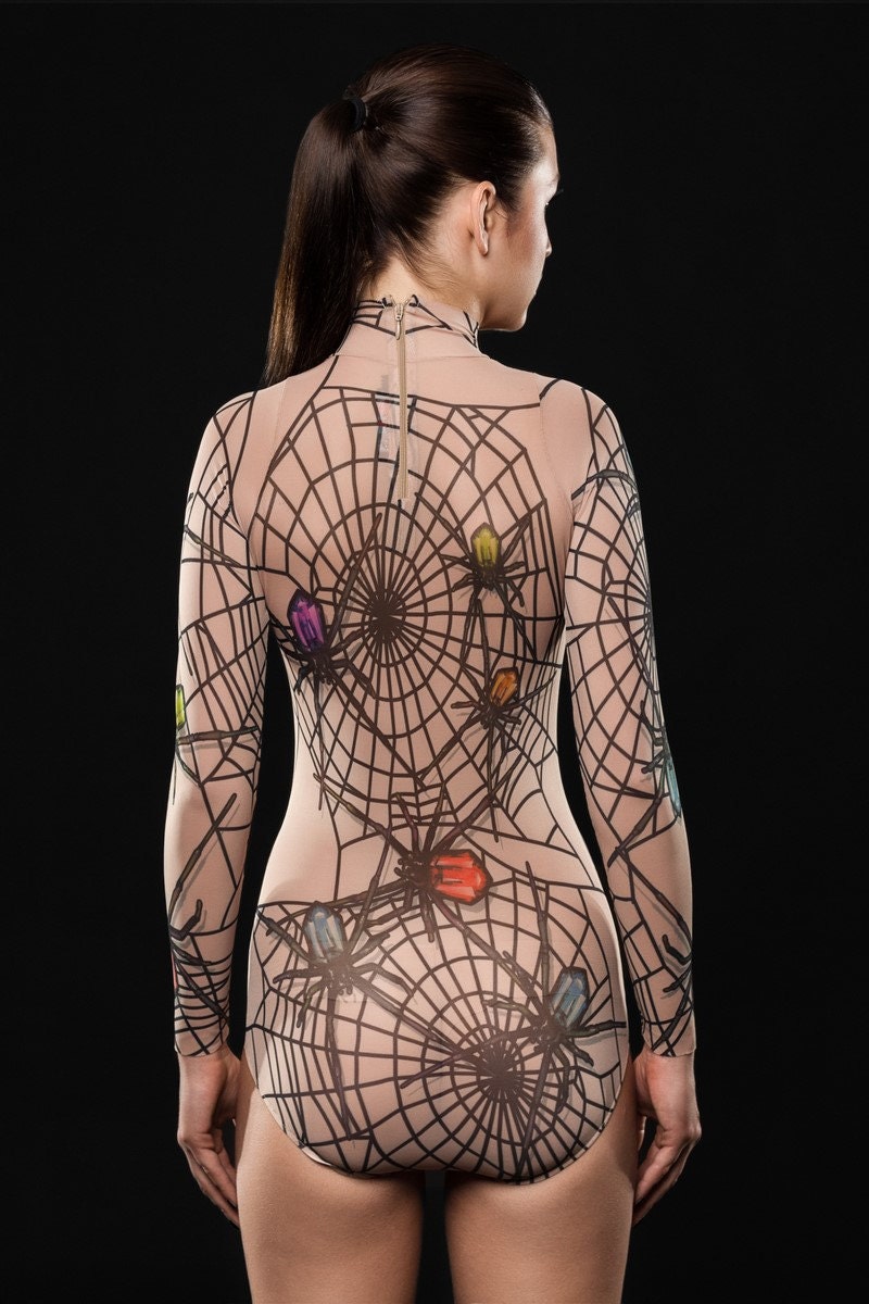 Close-up of the tattoo-style spiderweb design on the mesh bodysuit, ideal for a spooky Halloween or festival look.