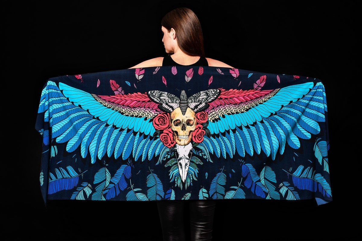 Skull Wings printed scarf, a versatile wrap with detailed skull and wing motifs, perfect for Halloween or as a gothic fashion statement.