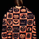 Close-up of the pumpkin, bat, and skull print on the Halloween scarf, adding a spooky yet stylish touch for Halloween outfits.