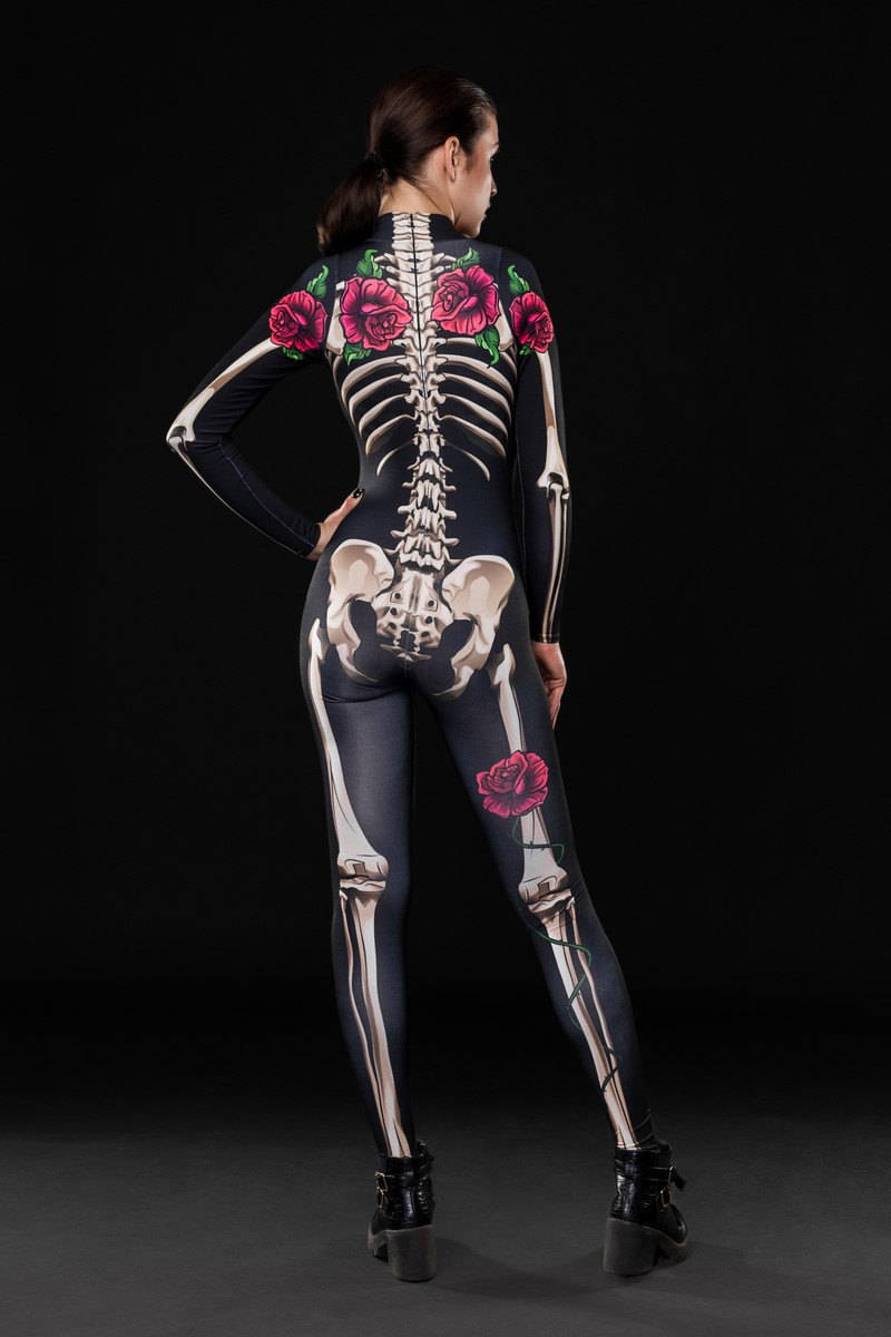 Woman wearing the Sexy Skeleton costume, featuring a sleek black catsuit with white skeleton details, perfect for Halloween or festival events.