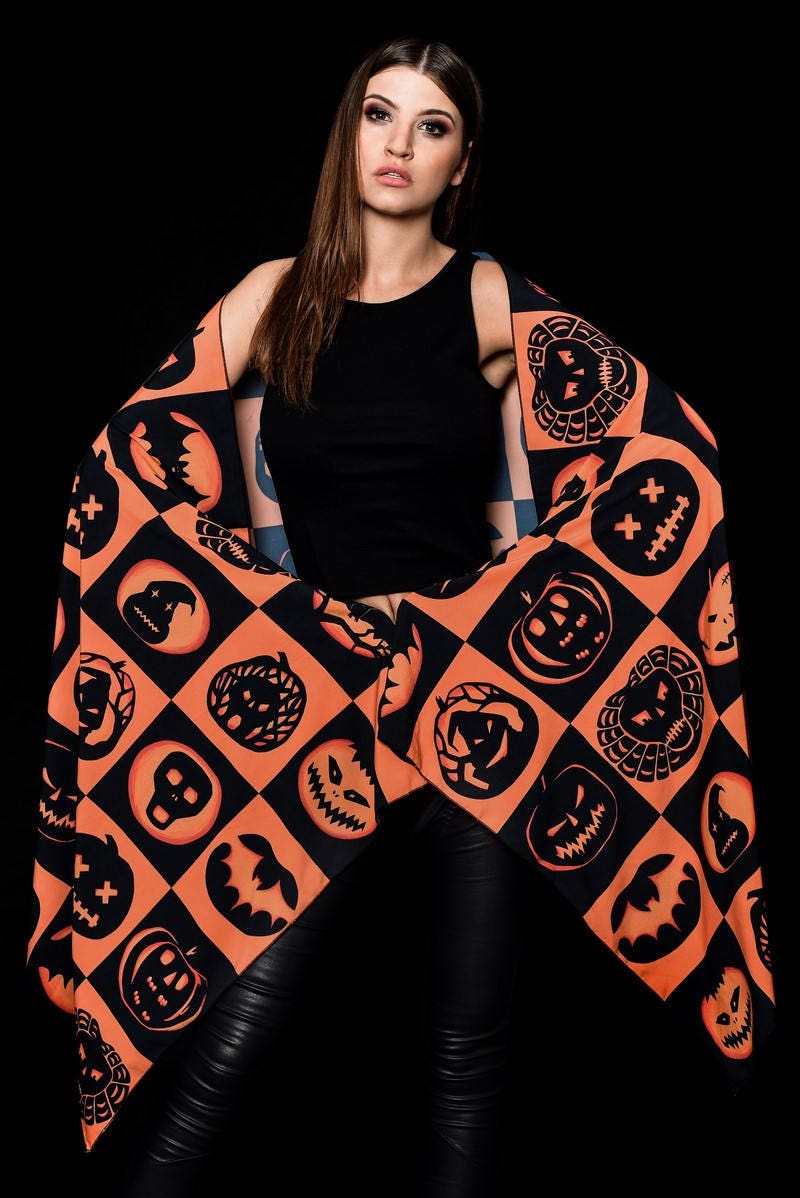 Halloween Pumpkins printed scarf, a versatile wrap with pumpkin and bat motifs, ideal for Halloween events or adding a festive look to fall outfits.