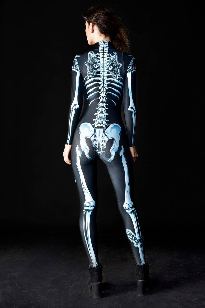 Close-up of the blue skeleton and skull moth design on the gothic full-body catsuit, ideal for a bold Halloween or festival look.