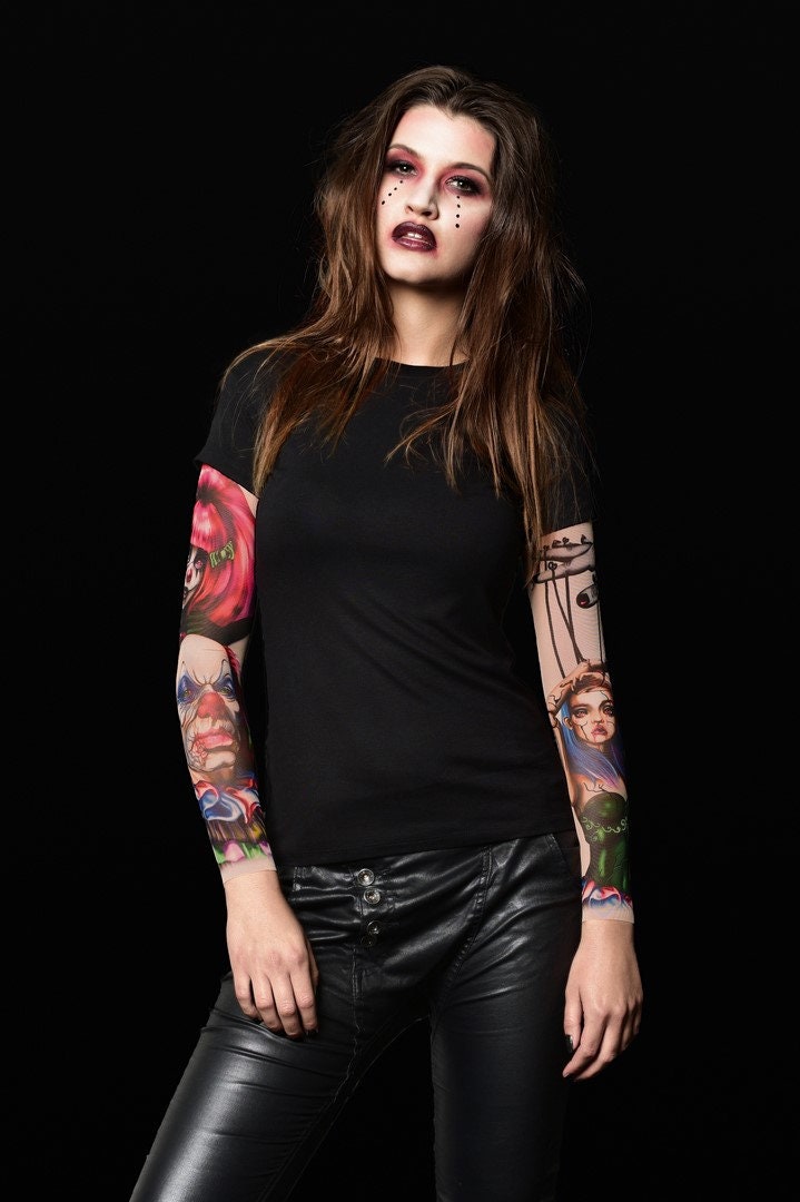 Black Mirror Circus Halloween T-shirt for women, featuring clown and circus-themed tattoo designs, perfect for Halloween parties or gothic fashion.