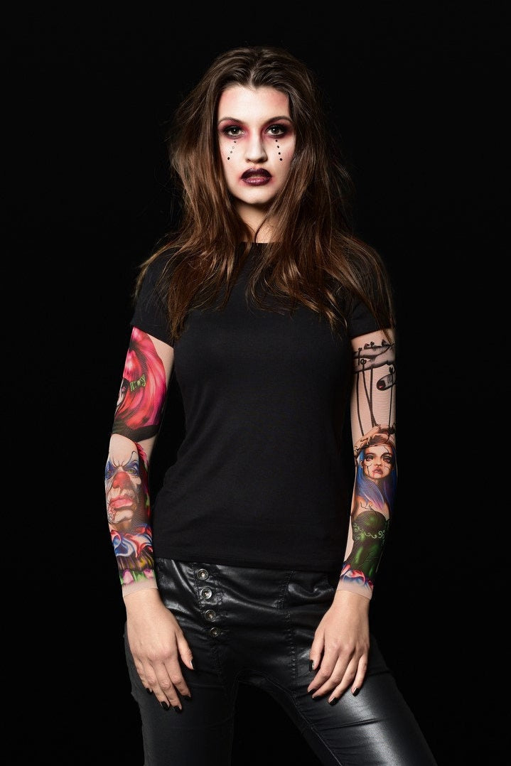 Black Mirror Circus Halloween T-shirt for women, featuring clown and circus-themed tattoo designs, perfect for Halloween parties or gothic fashion.