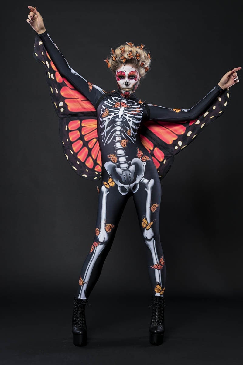 Lady Butterfly Skeleton Halloween costume for women, featuring a full-body skeleton suit with butterfly accents and wings, perfect for Day of the Dead or Halloween celebrations.