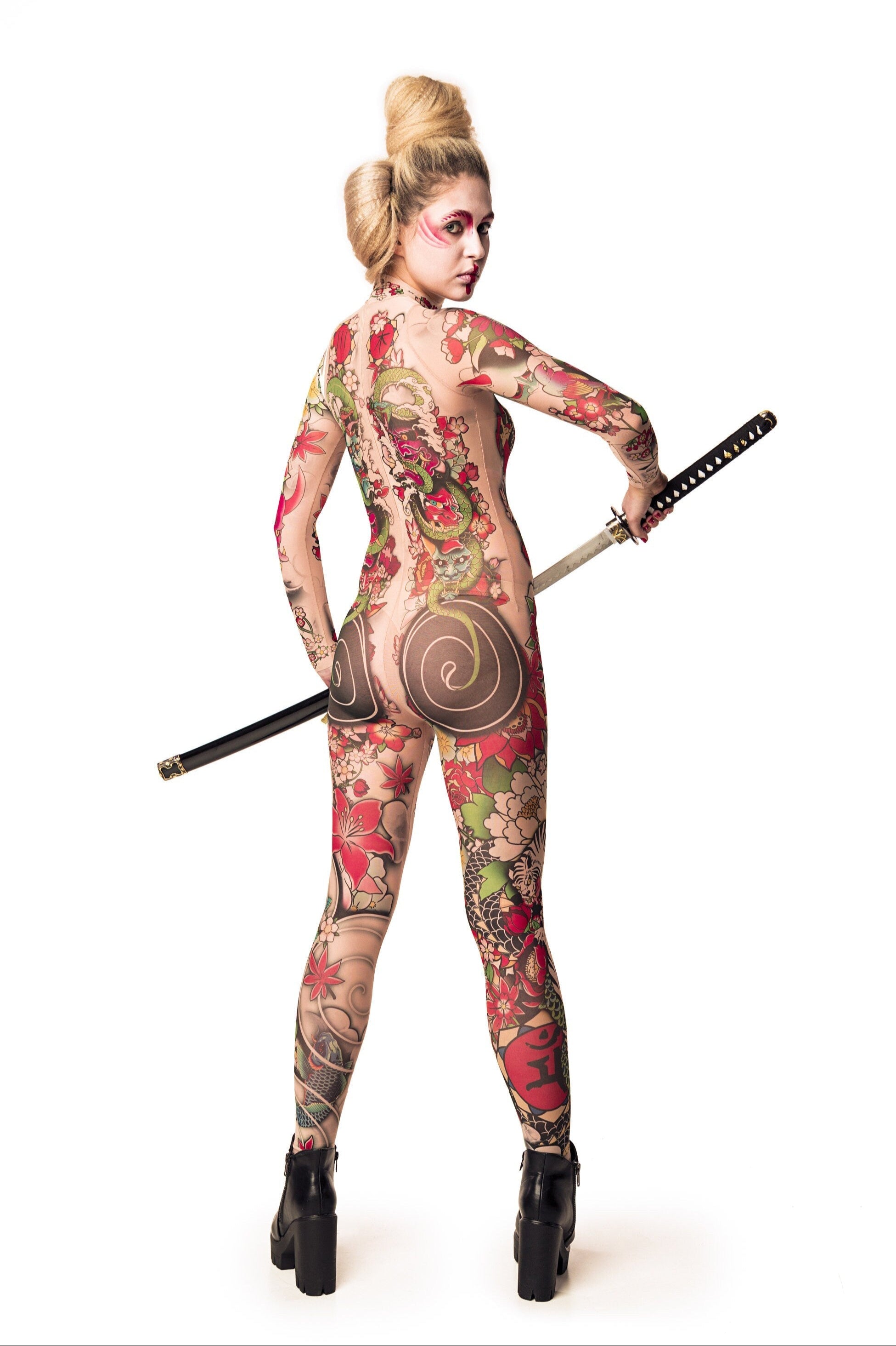 Back view Yakuza Style tattoo costume – full-body mesh catsuit with Japanese tattoo design, model with sword.