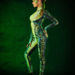 Woman posing in the Green Snake Halloween costume, highlighting the sleek green snake skin design and tattoo effect, great for Halloween events or as a unique festival outfit.