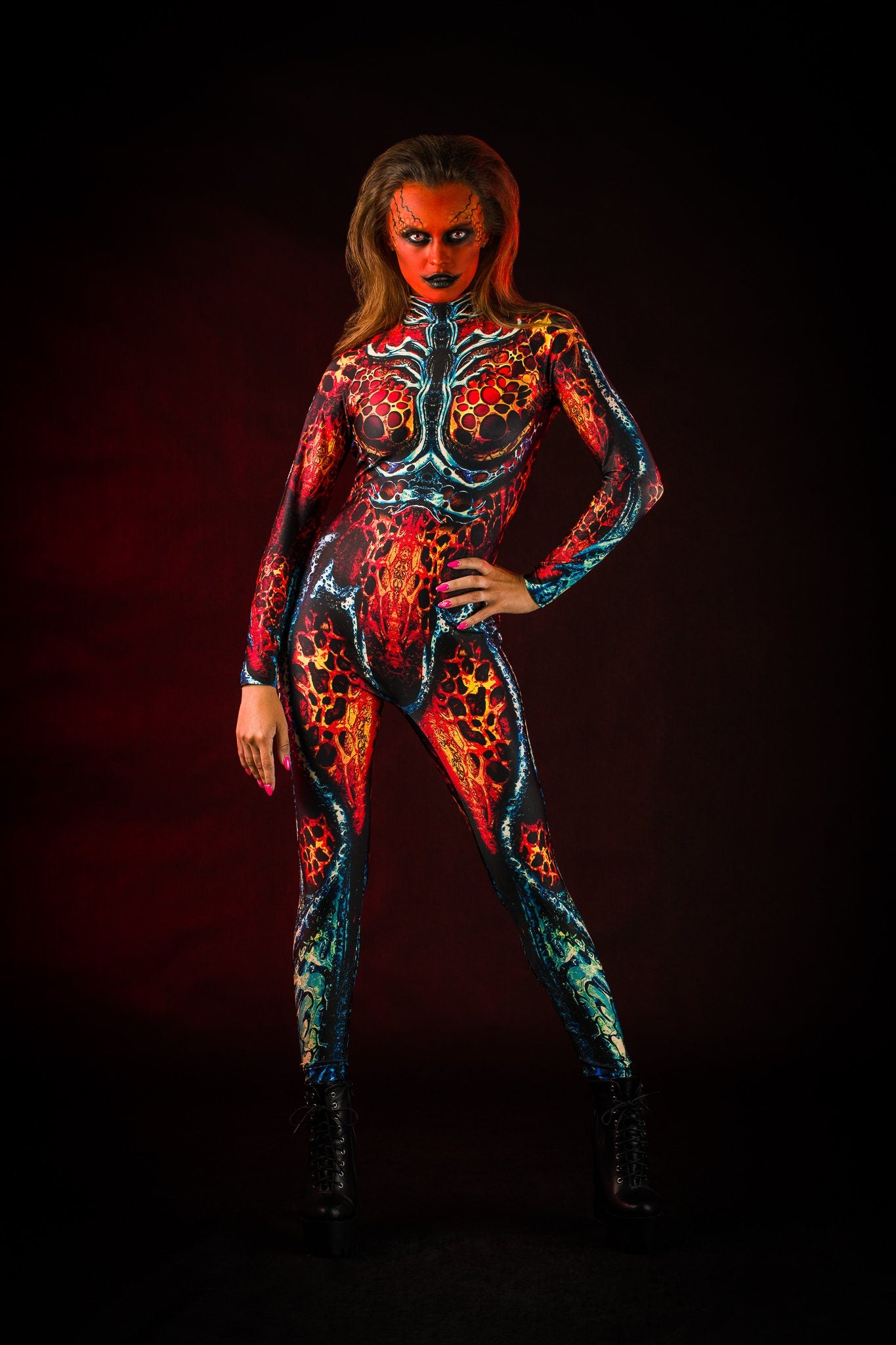 Woman posing in the Demon is a Woman costume, demonstrating the dramatic demonic design and gothic elements for a striking Halloween appearance.