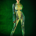 Green Snake Halloween costume for women, featuring a snake skin jumpsuit with tattoo effect on the back, ideal for Halloween parties or music festivals.