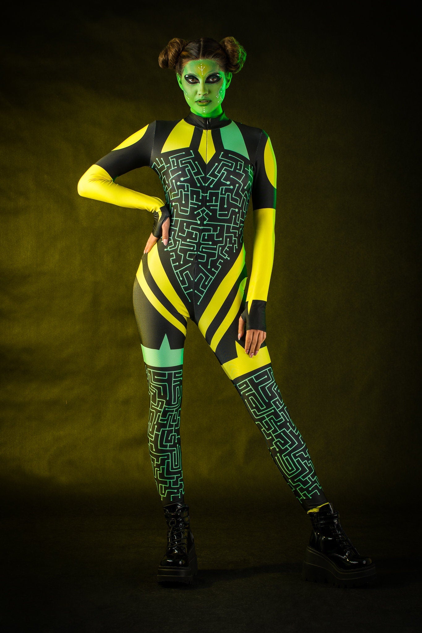 Green Alien Halloween costume for women, featuring a full-body jumpsuit with tattoo effect on the back, inspired by UFO and alien themes, perfect for Halloween or cosplay events.